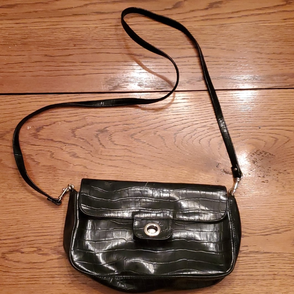Kim Roger's black purse, long handle